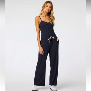 Vuori Pose Henley Jumpsuit in Black